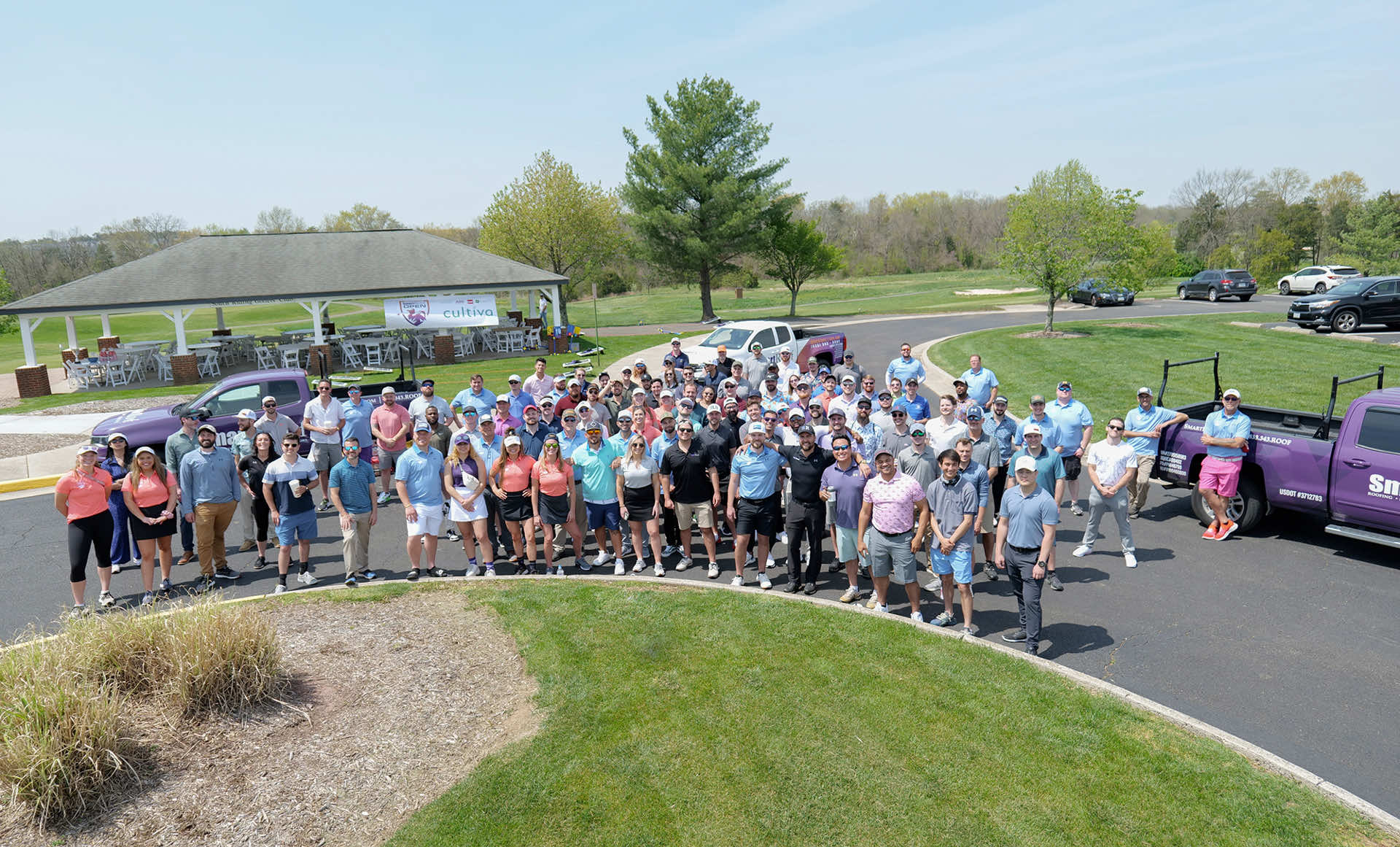 SmartRoof team gathered for a golf outing event