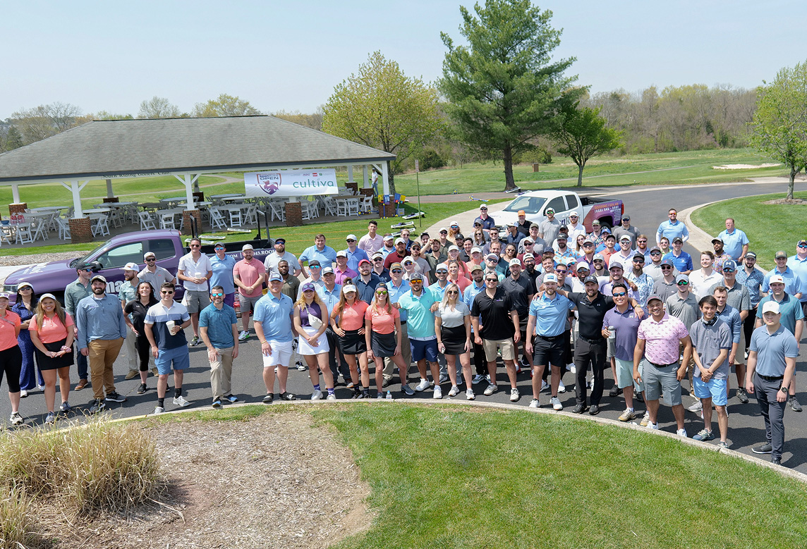 SmartRoof team gathered for a golf outing event