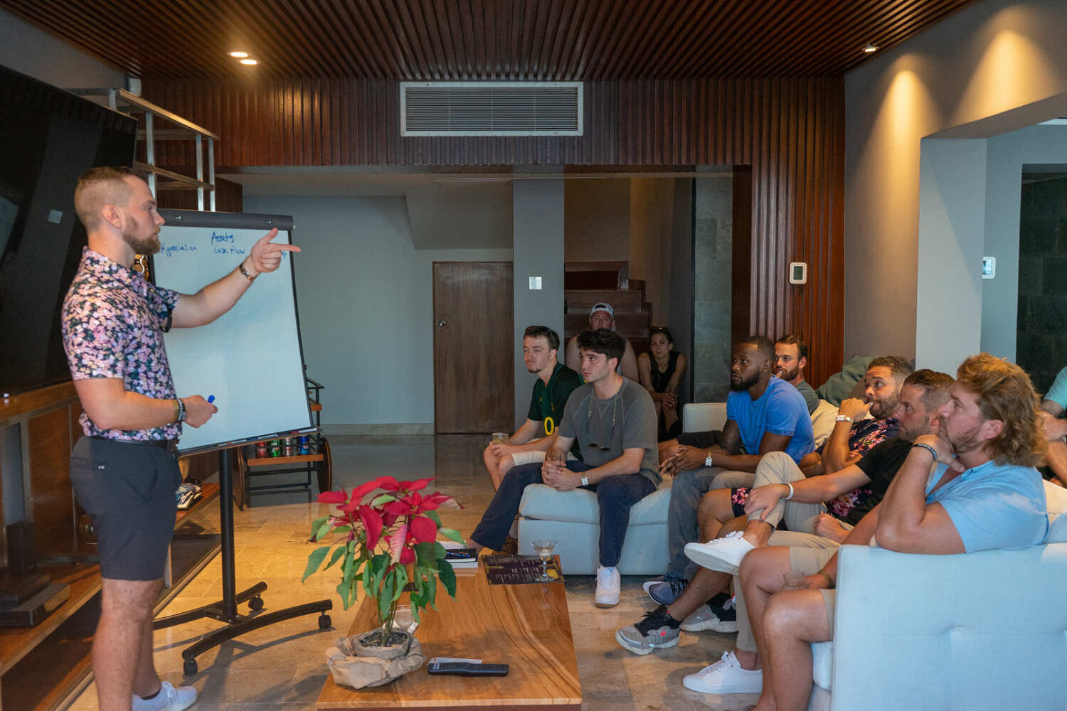 Team meeting with a speaker presenting to an engaged audience